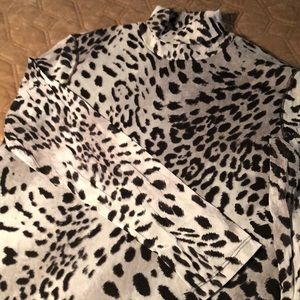 Chico’s turtleneck. Sheer animal print